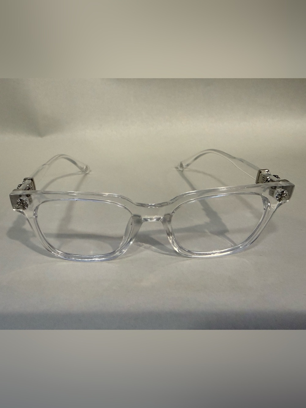CH Inspired Clear Rectangular Eyeglasses with Silver Eclipse Accent.